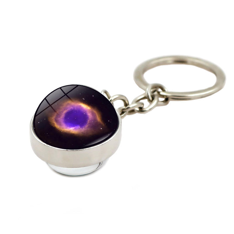 Llavero creativo al por mayor de la nebulosa de la galaxia del ojo de Dios de la aleación del cinc